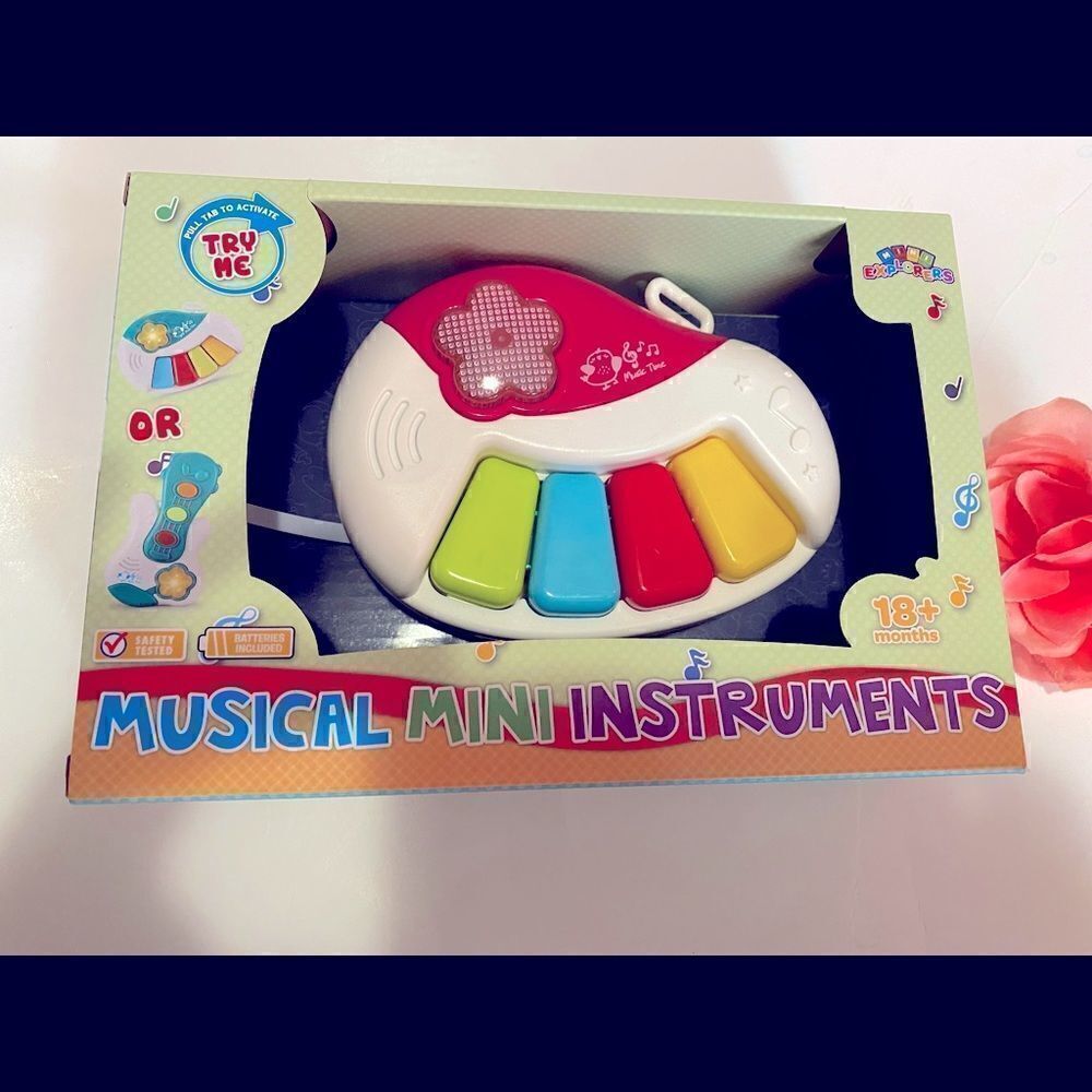 🛍 Mini Explorers Musical Mini instruments  Plays 12  fantastic Songs 18+months